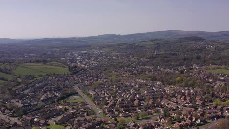 aerial drone elevation town in peak district united kingdom