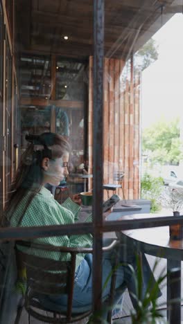 woman relaxing in a coffee shop