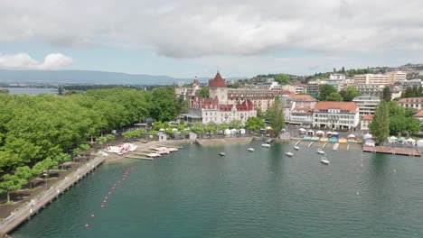 high angle view from lake geneva towards chateau d'ouchy in lausanne, switzerland