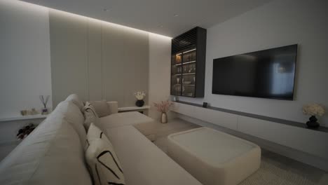 modern living room interior design and decoration with white sofa in living area, dining table and wooden chairs, kitchen counter and cabinets. 4k video 3d rendering apartment room with balcony