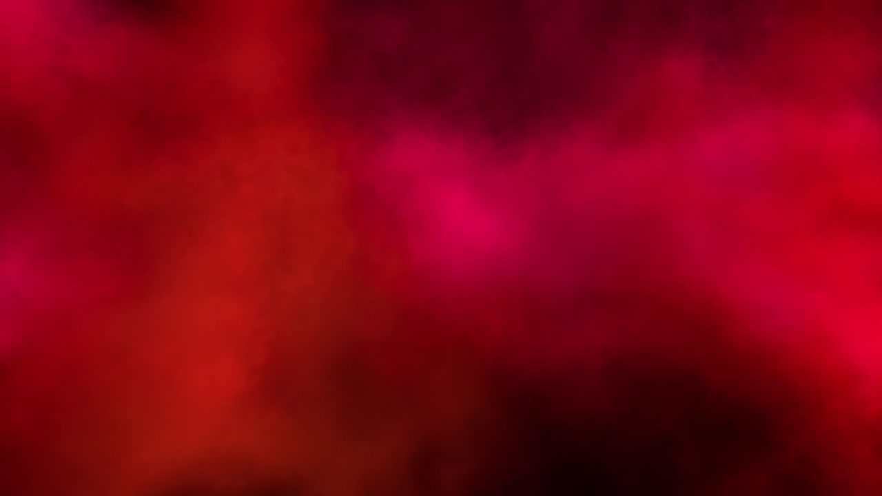 una explosión de humo de tamaño medio coloreado con rastros, se expande hacia la cámara.