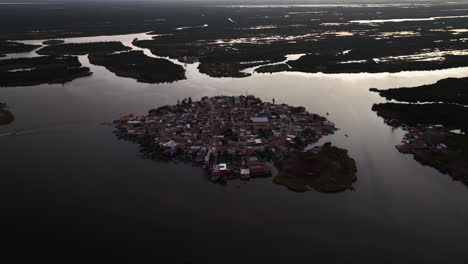 aerial view tilting away from the mexcaltitan magic town, dusk in nayarit, mexico