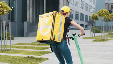 food delivery person on electric scooter