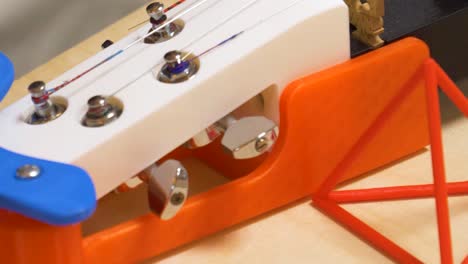 Close-up-shot-of-upper-part-of-3D-printed-violin