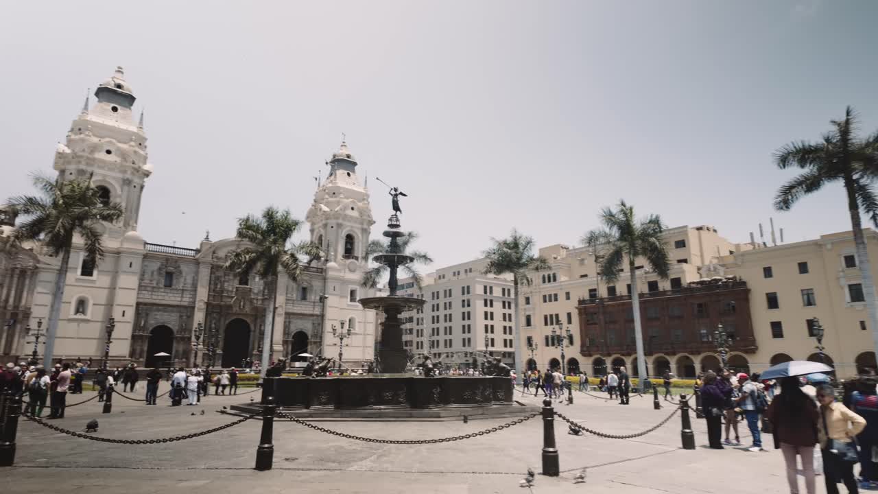 The Plaza Mayor de Lima With People Strolling In Lima District, Peru, South America. Sideways Shot