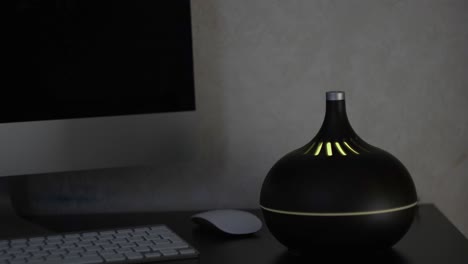 modern essential oil diffuser on a desk