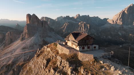 aerial view of mountain peaks during sunrise in the dolomites, italy