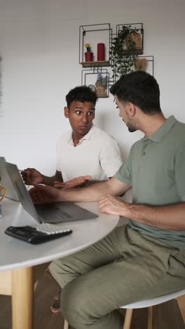 people working on a laptop