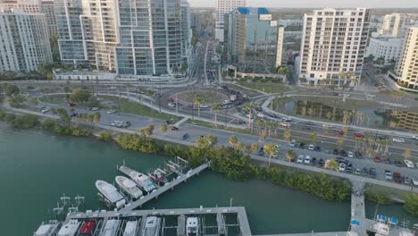 drone footage of freedom boat club at sarasota marina jack and bayfront park at sunset