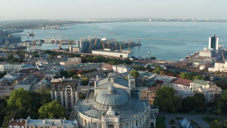 Ukraine---Odessa-Famous-Opera-Theatre-Building-in-Beautiful-Cityscape,-Aerial-Drone-Establishing