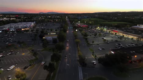 aerial view of a shopping center at sunset