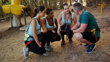 trainer instructing group of woman 4k