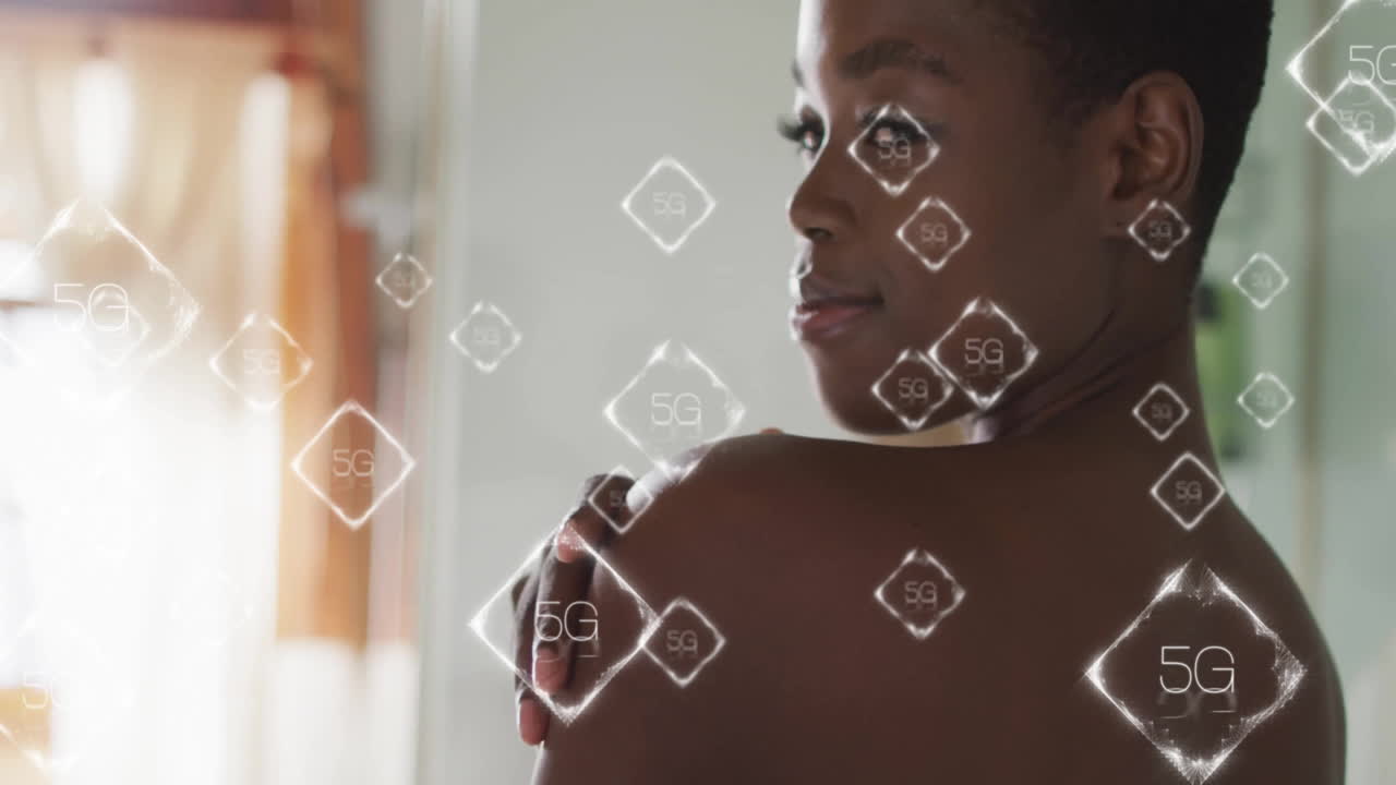 Looking over shoulder, woman with animation of 5G network symbols around her
