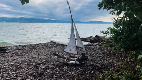 self made ship made out of wood in front of big lake in germany, bodensee