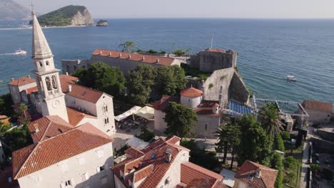 aerial: budva holy trinity church overlooking adriatic sea montenegro