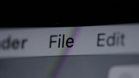 elemento de menú de archivo en una pantalla de computadora con un empujón lento