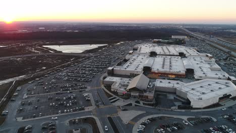 a drone captures sunset in niagara-on-the-lake at the outlet collection at niagara, a large outdoor shopping mall