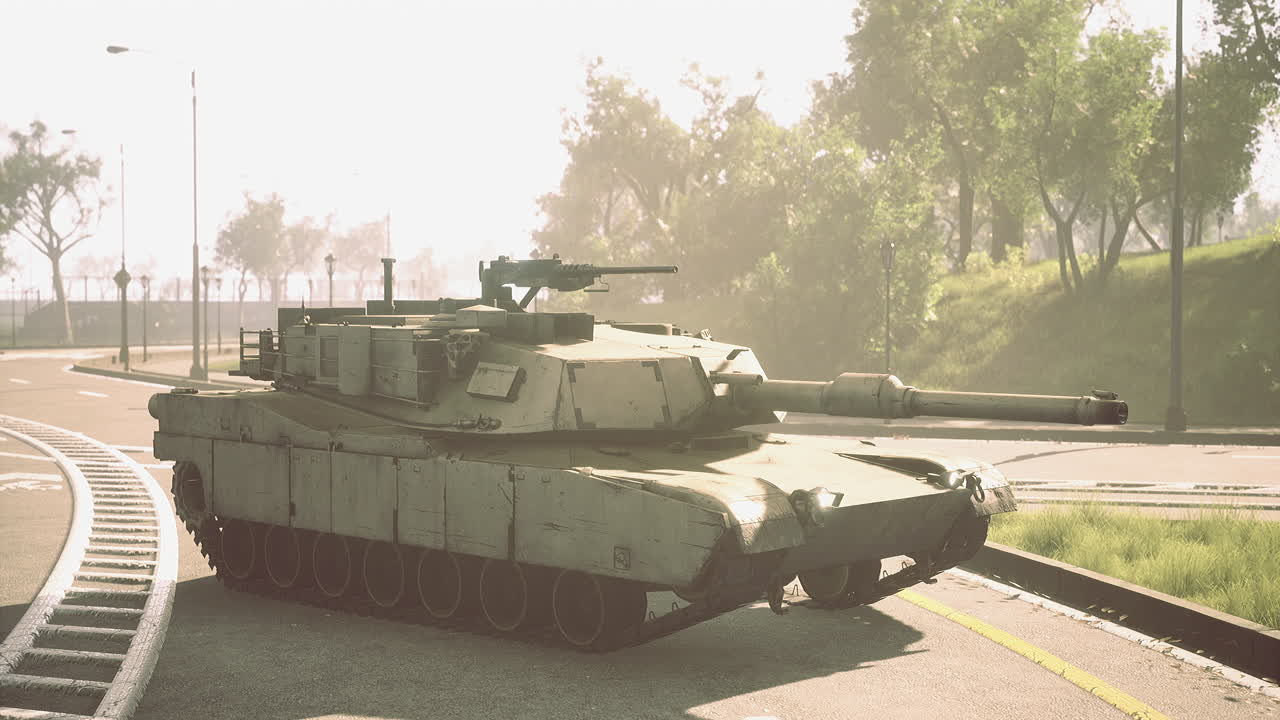 Military tank parked on quiet road surrounded by lush greenery
