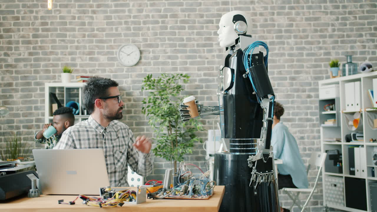 Robot assisting a team in a modern office environment