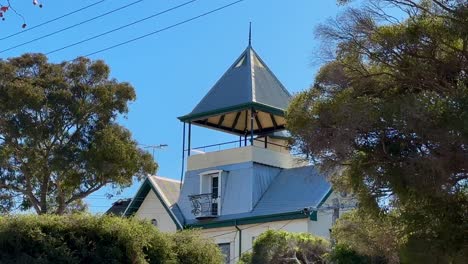 belvedere house lookout perth western australia with trees and blue sky