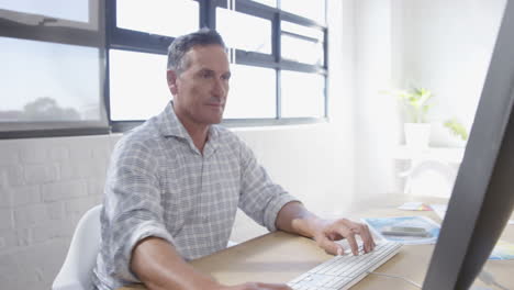business man working on his computer