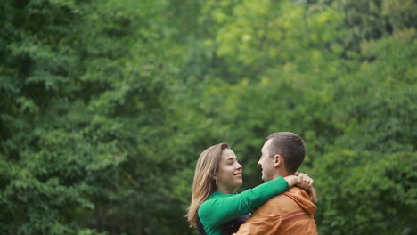 loving couple kissing outdoor. romantic couple in love kissing in nature