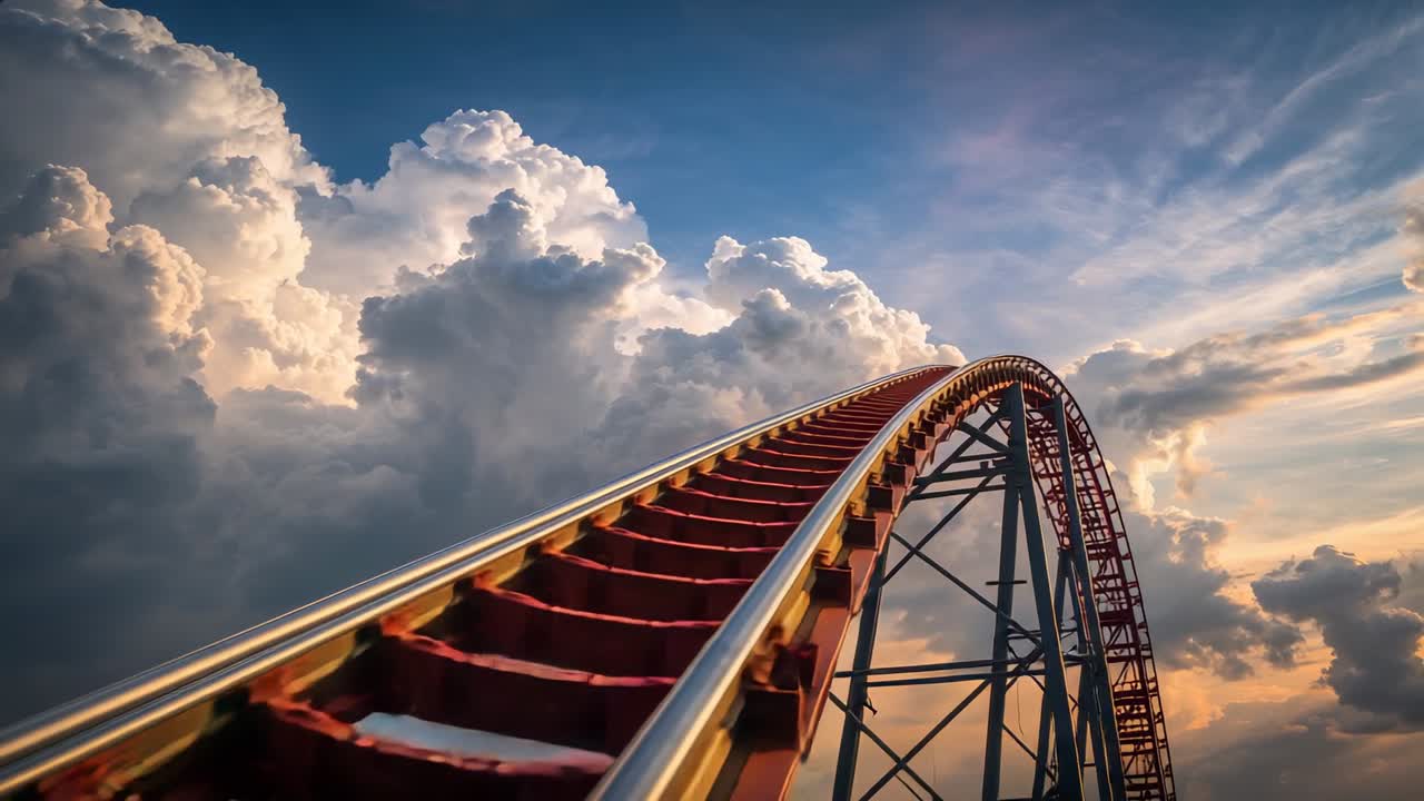 Engaging chain lift pulling coaster car climbing lift hill at amusement park, with red steel rails