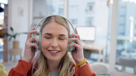 Music,-relax-and-happy-with-woman-on-sofa