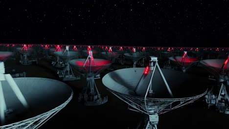 vista nocturna de la gran variedad de radiotelescopios