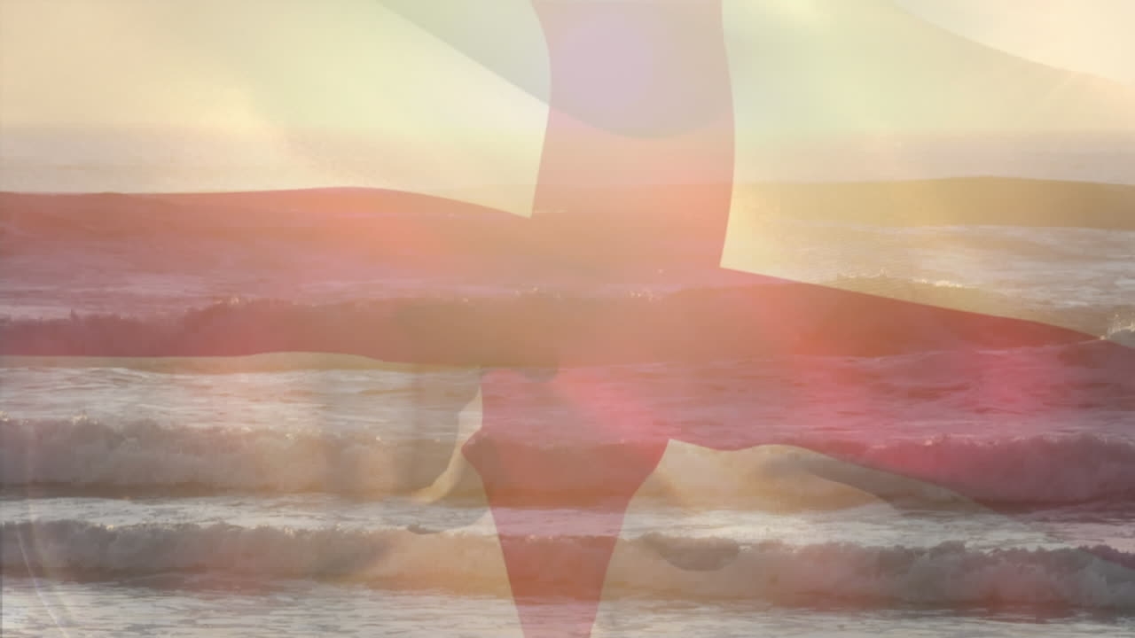 animación de la bandera de inglaterra soplando sobre las olas en el mar