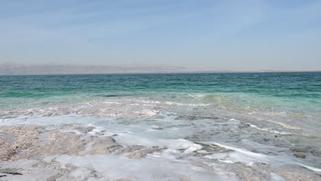 video of some waves of the dead sea breaking on the jordanian coast.