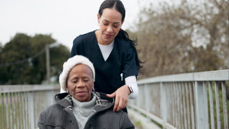 Caregiver, wheelchair and senior woman at park
