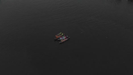 boats on thu bon river at hoi an old town vietnam with laterns, aerial