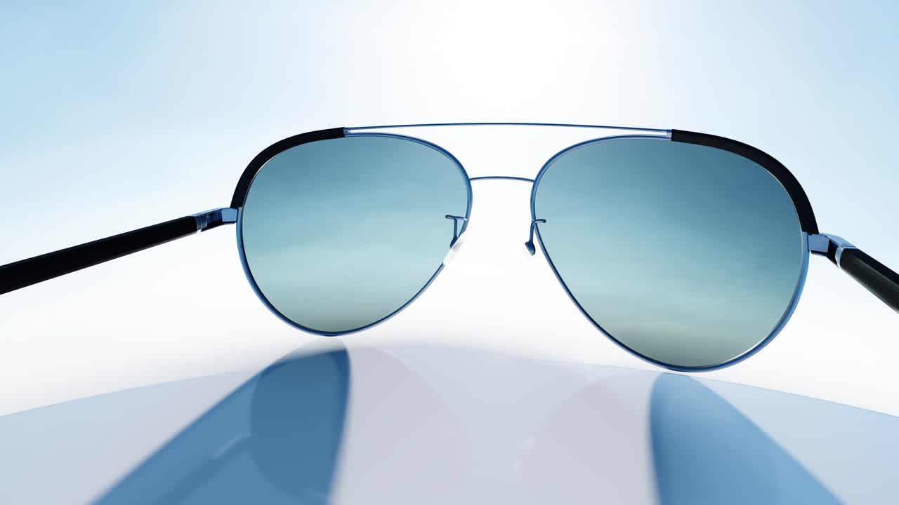 Sleek Aviator Sunglasses Displayed Against a Bright Blue Background
