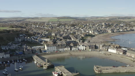 an aerial view of stonehaven town and harbour on a sunny day, aberdeenshire, scotland