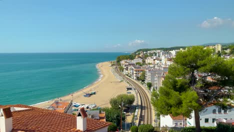 San-Pol-de-Mar-village-view-from-above-beach-train-tracks-white-houses