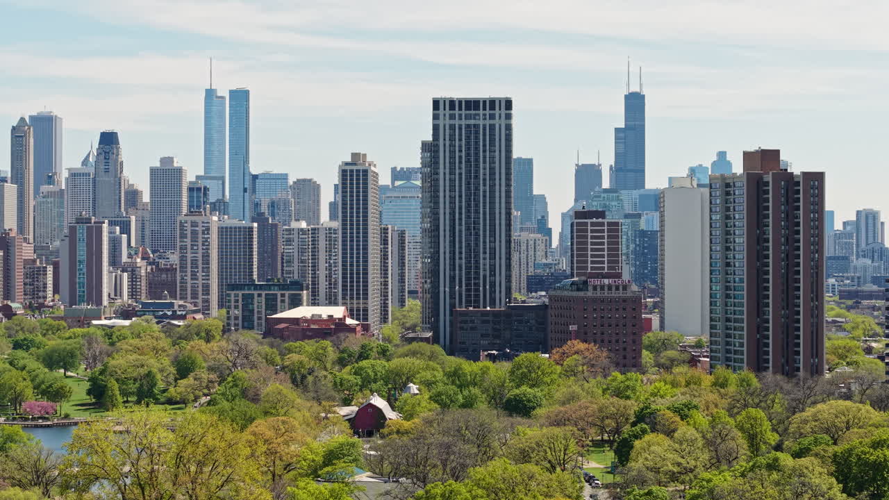 Chicago USA Residential Towers and Downtown Skyscrapers, Drone Shot From Lincoln Park on Sunny Summer Day