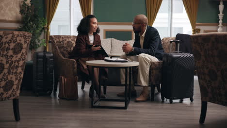 business meeting in hotel lobby