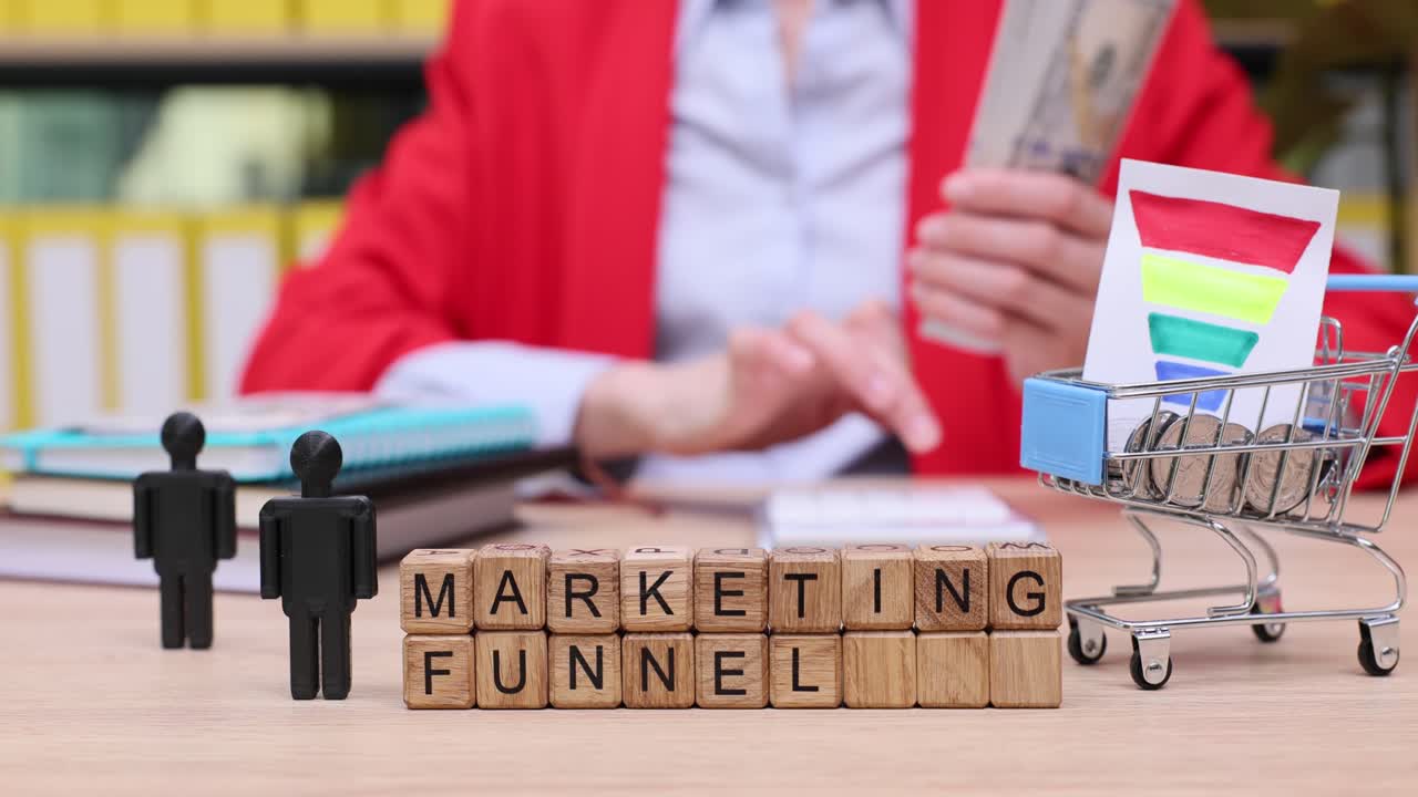 Marketing Funnel Concept with Wooden Blocks and Business Elements