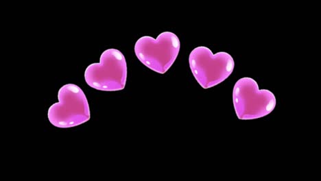 animación forma de corazones rosados flotando sobre un fondo negro.