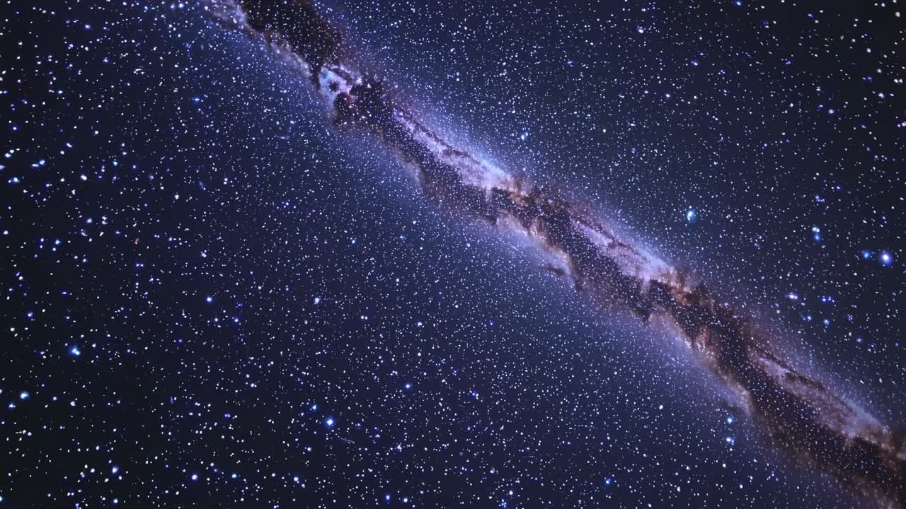 A mesmerizing video showcasing the vastness of the galaxy, with stars twinkling against a dark sky
