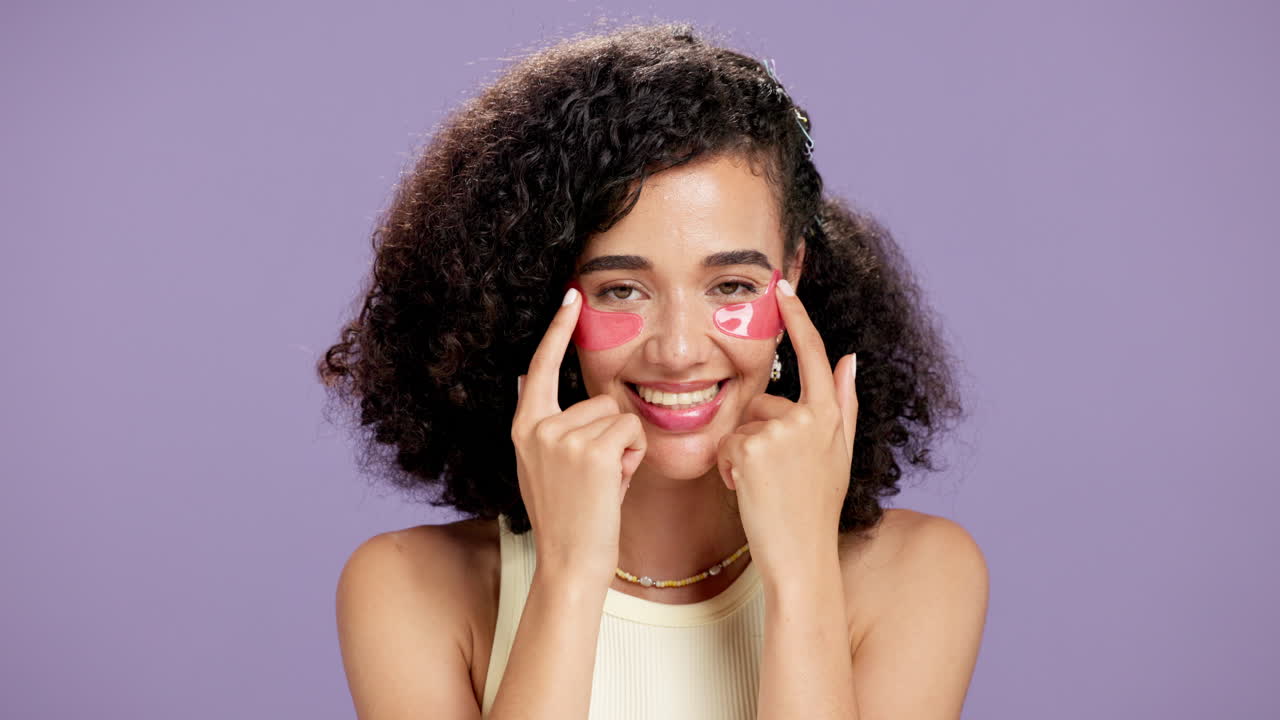 Woman with Eye Patches on Purple Background