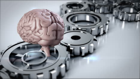 animation of brain rotating over gears on grey background