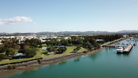 Drone-aerial-over-Gladstone-with-boats-in-harbour-on-blue-water-on-sunny-day