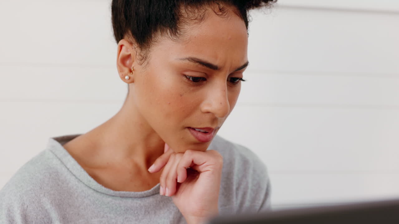 Thinking, working and black woman on laptop