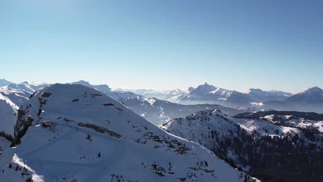 Aerial-view-of-snowy-mountain-peaks-in-the-Alps