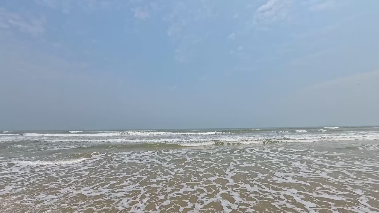 Calm Beach Scene with Waves