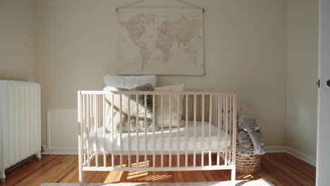 push-in-shot-of-a-baby-crib-within-the-nursery-of-a-home