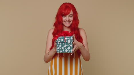 Redhead-winner-girl-receive-gift-box-bonus,-birthday-surprise,-expressing-great-happiness-amazement