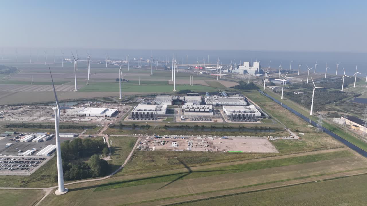 Aerial View of a Wind Farm and Power Plant